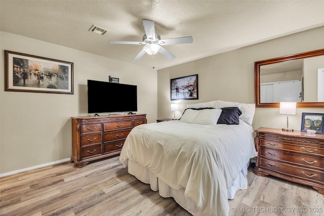 6356 S 80th E Ave Unit 25C, Tulsa, OK 74133 - bedroom featuring light wood finished floors, baseboards, and a ceiling fan