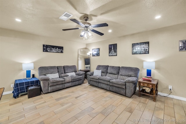 6356 S 80th E Ave Unit 25C, Tulsa, OK 74133 - living area featuring a ceiling fan, light wood finished floors, baseboards, and recessed lighting