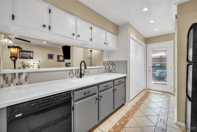 6356 S 80th E Ave Unit 25C, Tulsa, OK 74133 - kitchen with black appliances, a sink, gray cabinetry, light tile patterned flooring, and inlaid floor details