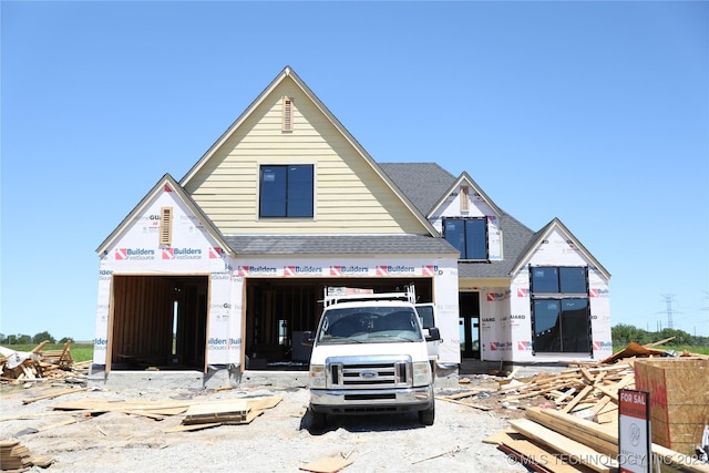2717 E 134th Cir, Bixby, OK 74008 - property in mid-construction with an attached garage and a shingled roof