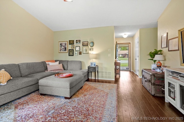 4407 W Lansing Pl, Broken Arrow, OK 74012 - living area featuring dark wood-style floors and baseboards