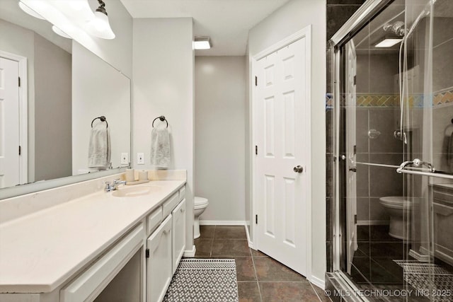 4407 W Lansing Pl, Broken Arrow, OK 74012 - full bath featuring toilet, vanity, a stall shower, tile patterned floors, and baseboards