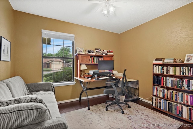 4407 W Lansing Pl, Broken Arrow, OK 74012 - office area with wood finished floors, ceiling fan, and baseboards