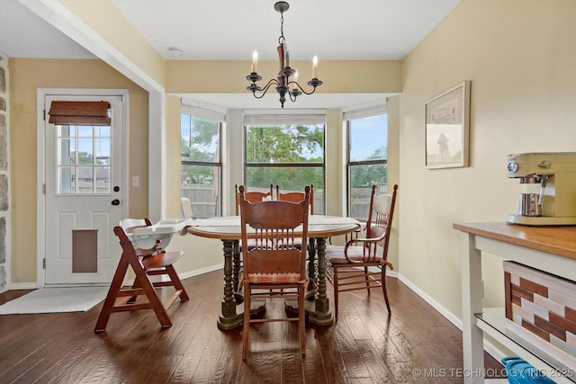 4407 W Lansing Pl, Broken Arrow, OK 74012 - dining space with dark wood-type flooring, a chandelier, and baseboards