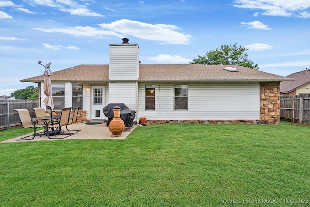4407 W Lansing Pl, Broken Arrow, OK 74012 - back of house with a chimney, a patio area, and roof with shingles