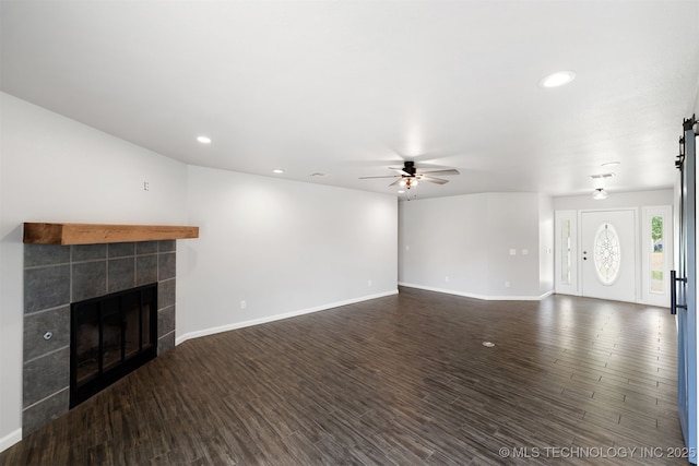 3160 E 406th Rd, Oologah, OK 74053 - unfurnished living room with a ceiling fan, a fireplace, wood finished floors, recessed lighting, and baseboards