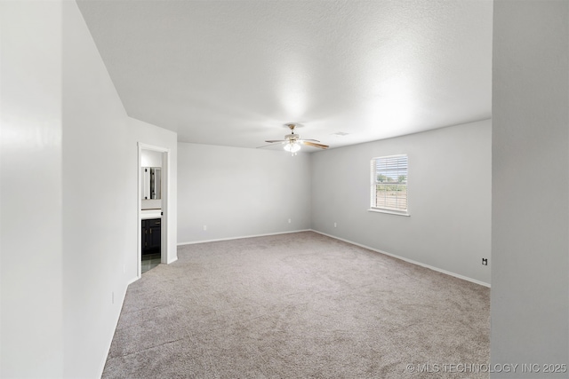 3160 E 406th Rd, Oologah, OK 74053 - unfurnished room featuring carpet, ceiling fan, and baseboards