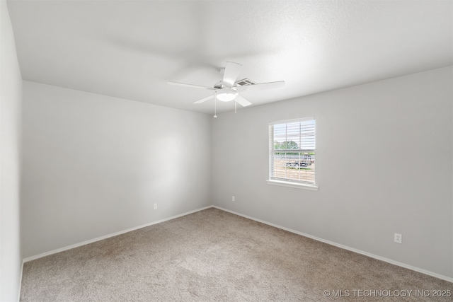 3160 E 406th Rd, Oologah, OK 74053 - carpeted spare room with a ceiling fan and baseboards