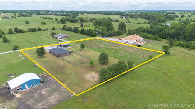 3160 E 406th Rd, Oologah, OK 74053 - aerial view of sparsely populated area with property parcel outlined and a pastoral area