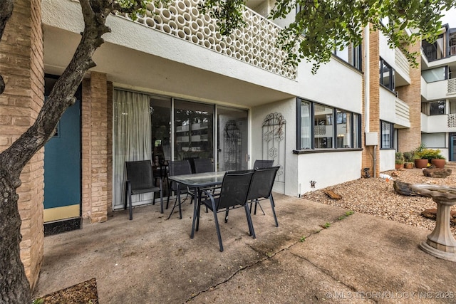 611 W 15th St Unit F1, Tulsa, OK 74127 - view of patio / terrace with outdoor dining space
