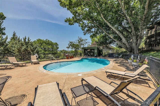 611 W 15th St Unit F1, Tulsa, OK 74127 - community pool featuring a patio area