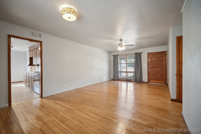 5856 E 22nd St, Tulsa, OK 74114 - spare room with ceiling fan, light wood-style flooring, crown molding, and baseboards