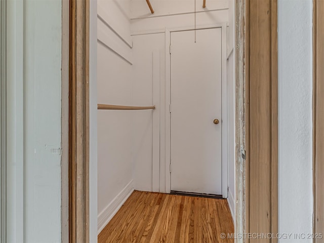3504 E Haskell St, Tulsa, OK 74115 - walk in closet featuring light wood-style flooring
