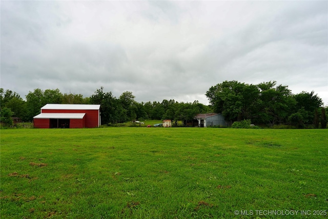 9406 S 161st Ave W, Sapulpa, OK 74066 - view of grassy yard featuring an outbuilding and an outdoor structure