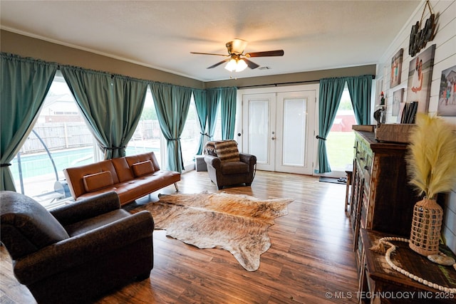 9406 S 161st Ave W, Sapulpa, OK 74066 - living area with crown molding, a ceiling fan, and wood finished floors