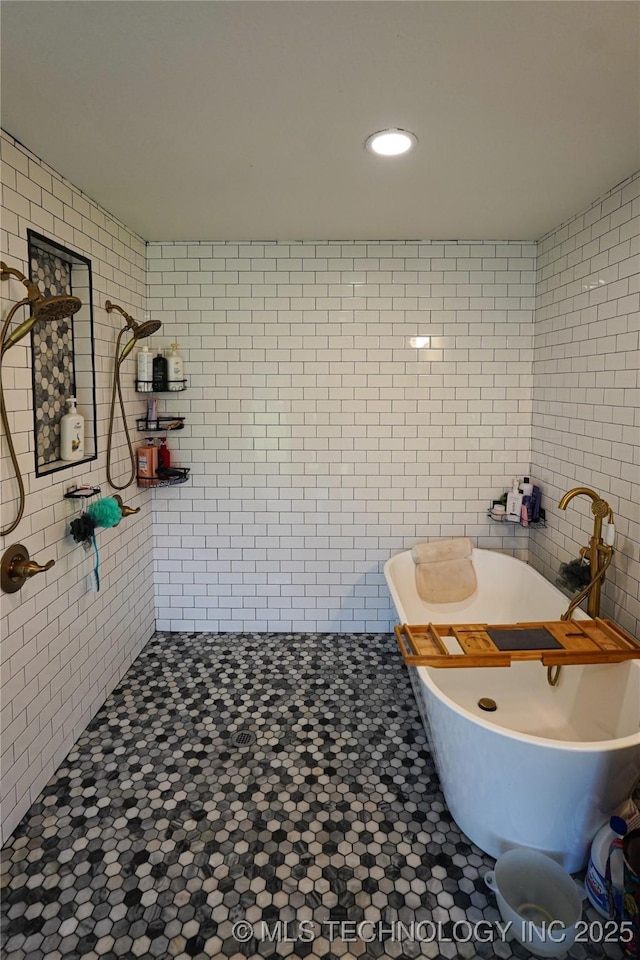 9406 S 161st Ave W, Sapulpa, OK 74066 - bathroom with tile walls, tiled shower, and a soaking tub