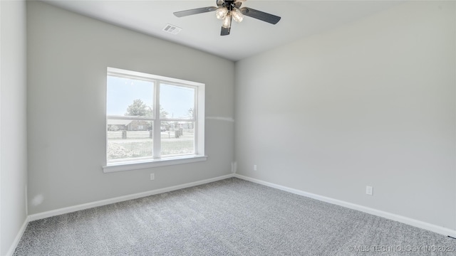 13801 N 54th E Ave, Collinsville, OK 74021 - carpeted empty room featuring baseboards and ceiling fan