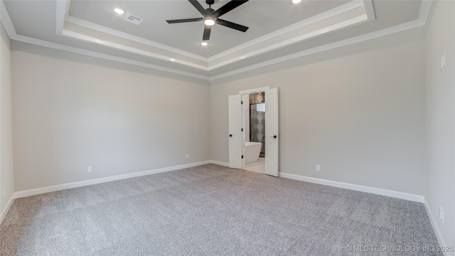 13801 N 54th E Ave, Collinsville, OK 74021 - carpeted spare room featuring a raised ceiling, crown molding, ceiling fan, recessed lighting, and baseboards