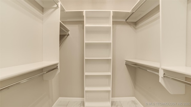 13801 N 54th E Ave, Collinsville, OK 74021 - spacious closet with light marble finish flooring