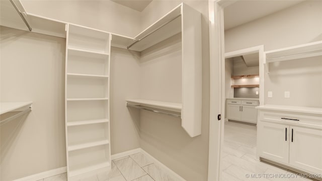 13801 N 54th E Ave, Collinsville, OK 74021 - spacious closet featuring light marble finish floors