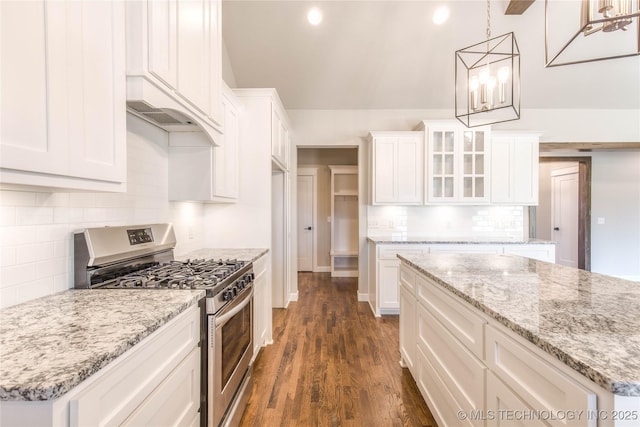 13801 N 54th E Ave, Collinsville, OK 74021 - kitchen with gas stove, tasteful backsplash, white cabinets, dark wood-style flooring, and glass insert cabinets