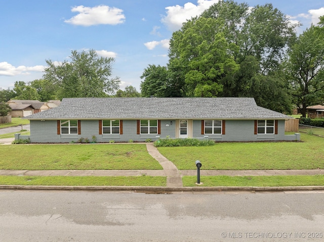6806 E 74th St, Tulsa, OK 74133 - ranch-style home featuring brick siding and a front yard