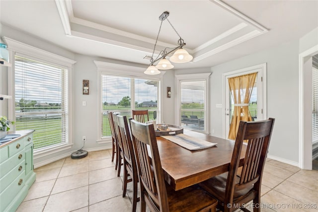13100 S 4080th Rd, Oologah, OK 74053 - dining space featuring a tray ceiling, light tile patterned flooring, a chandelier, and baseboards