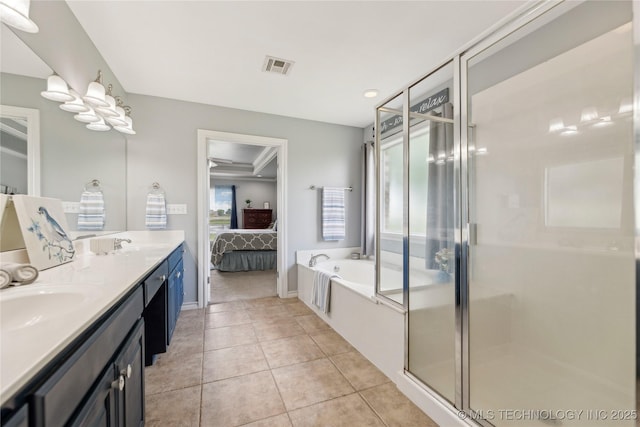 13100 S 4080th Rd, Oologah, OK 74053 - ensuite bathroom with double vanity, a garden tub, a stall shower, and tile patterned flooring