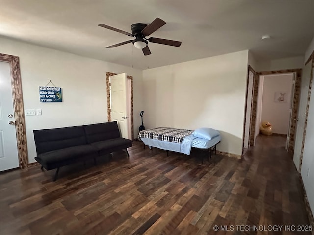3226 Lark Rd, Kingston, OK 73439 - bedroom featuring wood finished floors and ceiling fan