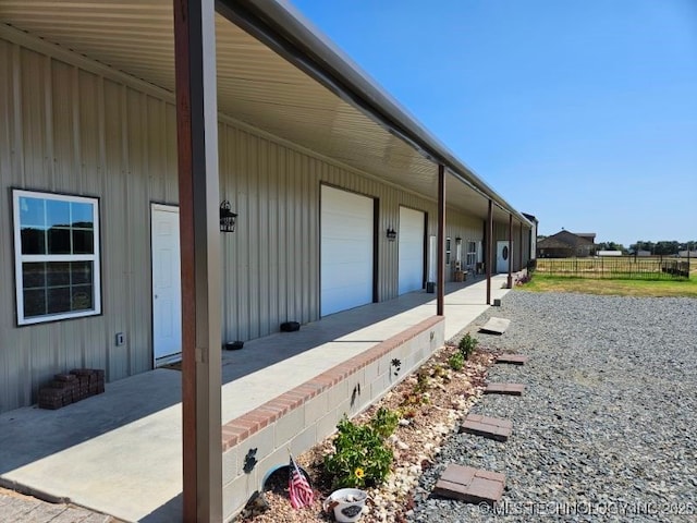 3226 Lark Rd, Kingston, OK 73439 - view of side of home featuring a garage