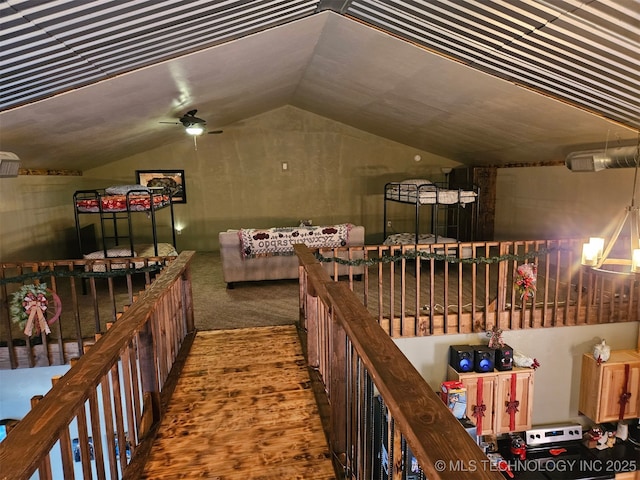 3226 Lark Rd, Kingston, OK 73439 - hallway featuring vaulted ceiling and carpet