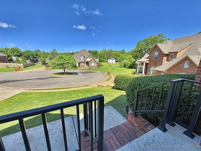 103 S Harrison Ave, Tahlequah, OK 74464 - view of grassy yard featuring a residential view