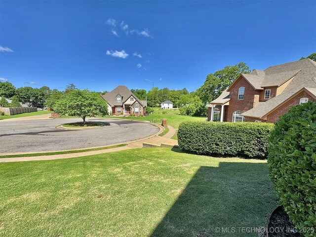 103 S Harrison Ave, Tahlequah, OK 74464 - view of green lawn featuring a residential view