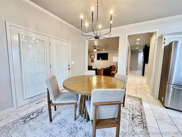 103 S Harrison Ave, Tahlequah, OK 74464 - dining room featuring light marble finish floors, crown molding, a chandelier, baseboards, and ceiling fan