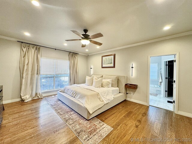 103 S Harrison Ave, Tahlequah, OK 74464 - bedroom featuring wood finished floors, crown molding, recessed lighting, baseboards, and ceiling fan