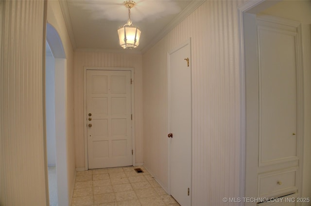 6788 E 66th Pl, Tulsa, OK 74133 - hallway featuring light floors, crown molding, and baseboards