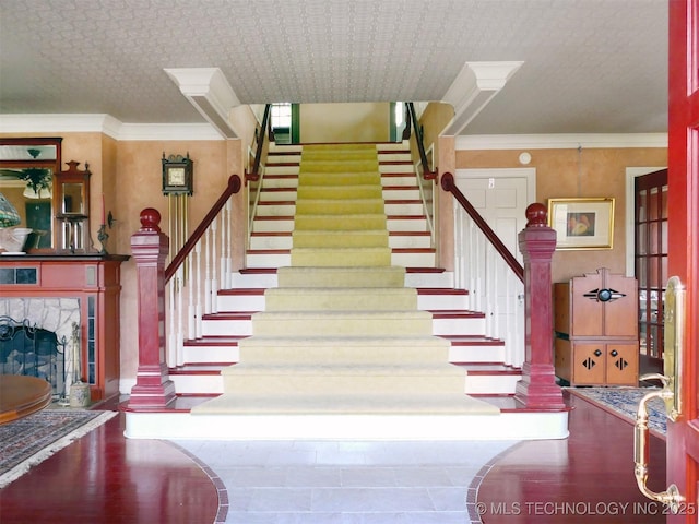 640 W 14th St, Tulsa, OK 74127 - stairs featuring a fireplace and crown molding