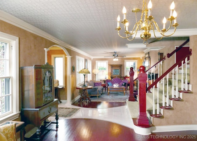 640 W 14th St, Tulsa, OK 74127 - entryway featuring hardwood / wood-style flooring, arched walkways, baseboards, a ceiling fan, and crown molding