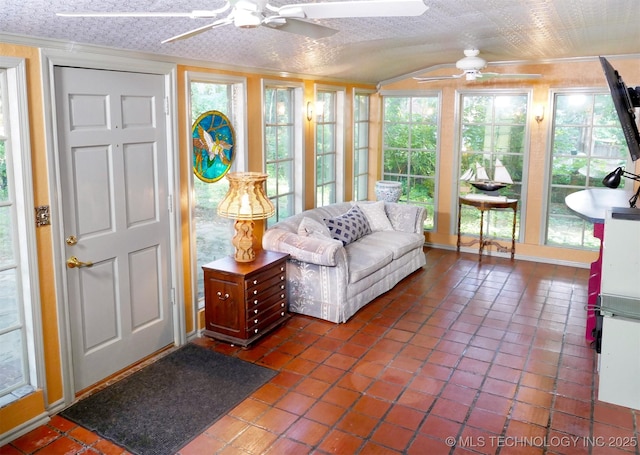 640 W 14th St, Tulsa, OK 74127 - sunroom / solarium with crown molding, vaulted ceiling, and tile patterned floors