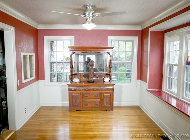 640 W 14th St, Tulsa, OK 74127 - interior space featuring light wood-style floors, ornamental molding, and a wainscoted wall