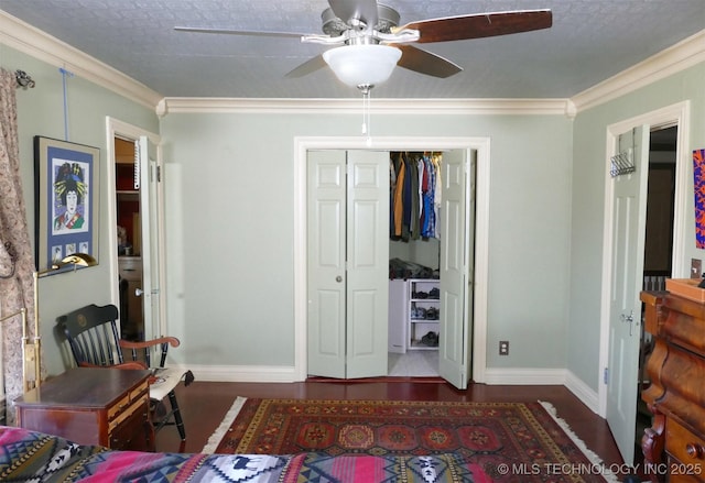 640 W 14th St, Tulsa, OK 74127 - bedroom with baseboards, ornamental molding, a closet, wood finished floors, and a ceiling fan