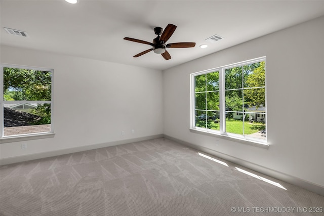 4127 S Cincinnati Ave, Tulsa, OK 74105 - empty room featuring baseboards, light colored carpet, ceiling fan, and recessed lighting