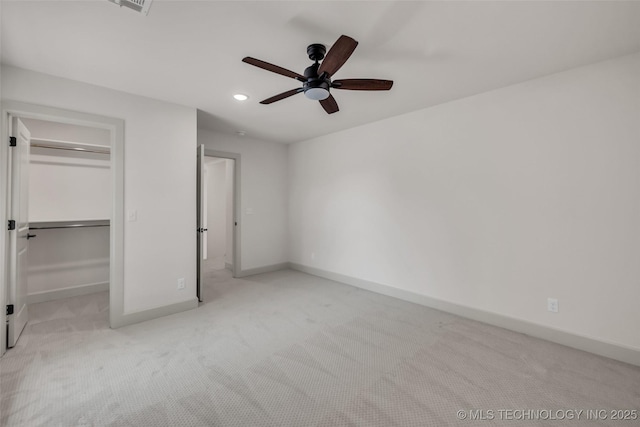 4127 S Cincinnati Ave, Tulsa, OK 74105 - unfurnished bedroom with carpet floors, baseboards, recessed lighting, a walk in closet, and a ceiling fan