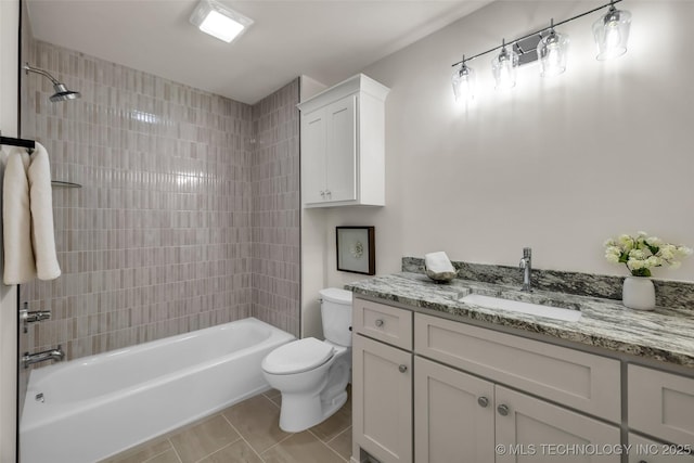 4127 S Cincinnati Ave, Tulsa, OK 74105 - bathroom with toilet, vanity, washtub / shower combination, and tile patterned flooring