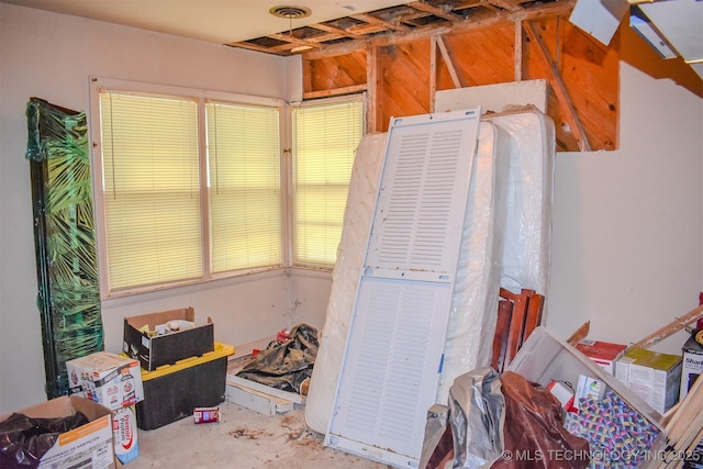 1108 E E Blf, Hugo, OK 74743 - misc room with unfinished concrete flooring