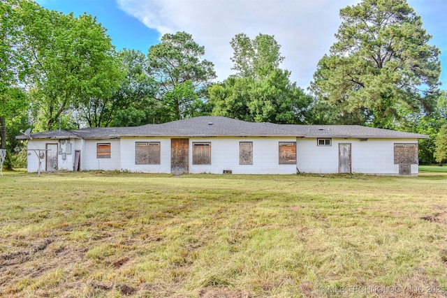 1108 E E Blf, Hugo, OK 74743 - back of property featuring a lawn and view of scattered trees