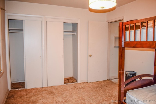 1108 E E Blf, Hugo, OK 74743 - carpeted bedroom with two closets