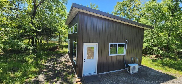140 Last Resort Rd, Stigler, OK 74462 - view of outbuilding with a cooling unit