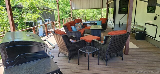 140 Last Resort Rd, Stigler, OK 74462 - wooden terrace with outdoor lounge area and grilling area