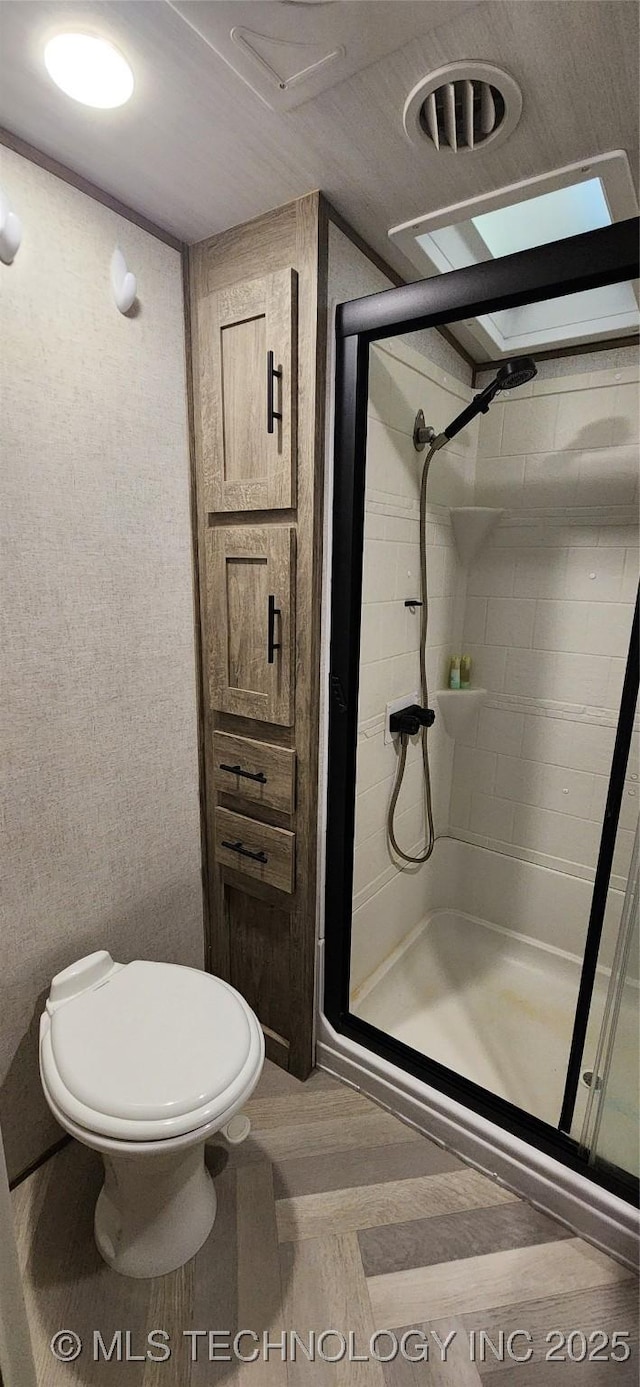 140 Last Resort Rd, Stigler, OK 74462 - bathroom featuring a stall shower and toilet